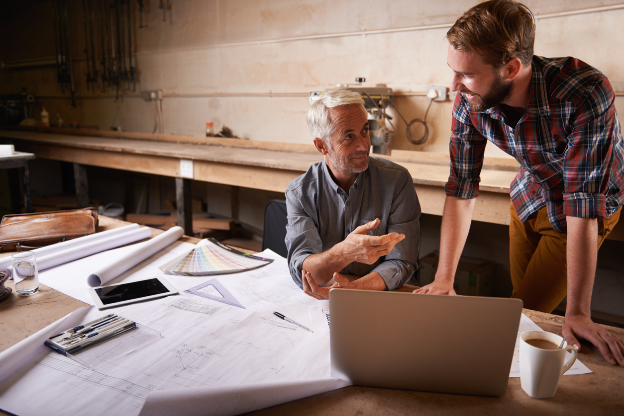 two workers discussing project